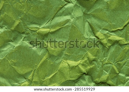Green crepe paper background abstract.