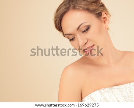 Portrait of woman with make-up looking down