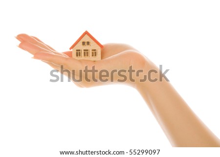 Woman hand with a little house