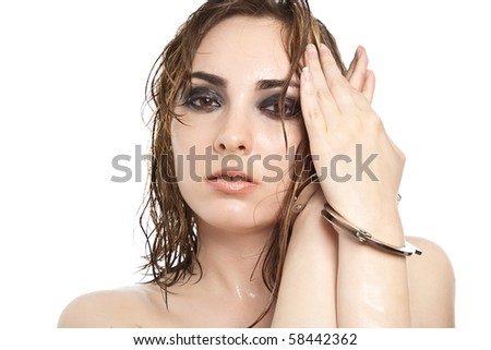 stock photo Sexy hot woman with handcuffs isolated on white