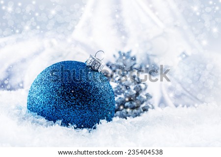 Luxury blue Christmas ball with ornaments in Christmas Snowy stil life. Christmas time