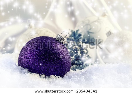 Luxury purple Christmas ball with ornaments in Christmas Snowy stil life. Christmas time