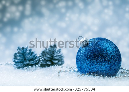 Christmas balls. Luxury Christmas ball with ornaments in Christmas Snowy Landscape. Christmas time.