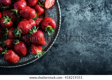 Strawberry. Fresh strawberry. Red strewberry. Strawberry Juice. Loosely laid strawberries in different positions.
