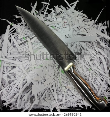 Shredding Documents by sharp steel knife