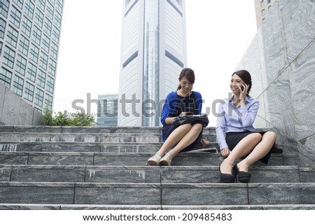 Women conversation on the stairs