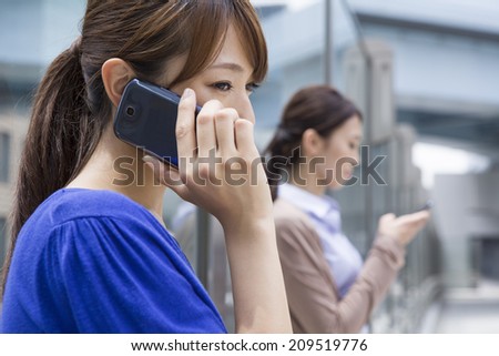 Women call in a smart phone