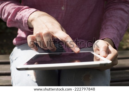 Woman to operate the tablet device