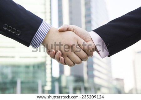 The handshake to businessman