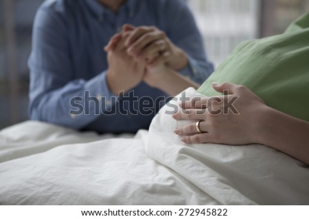 Pregnant woman and her husband isolated