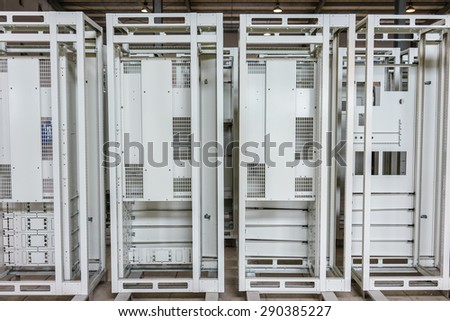 Frame of electrical switchboard in factory. electrostatic powder coating, standing floor