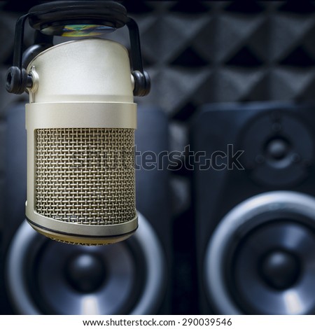 microphone and audio monitors in the studio