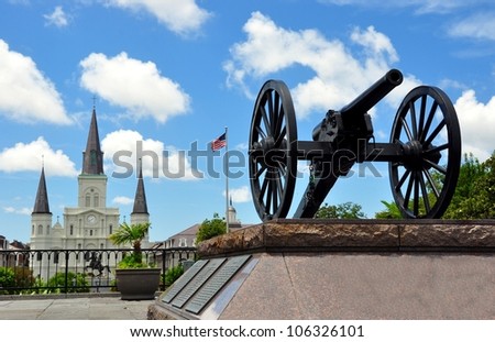 Civil War Cannon With Jackson Square And Saint Louis Cathedral In Background, French Quarter, New Orleans, Louisiana