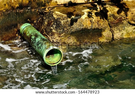 Industrial Pipe Dumping Waste Water Into The Ocean