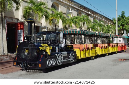 KEY WEST, Fl.-SEPTEMBER 3:  A Key West Conch Tour Train, a popular tourist attraction in Key West, waits to take the next group of visitors on a narrated tour of the island on September 3, 2014.