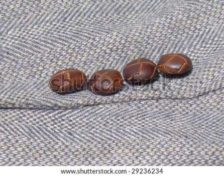 Leather Buttons On Tweed Jacket Sleeve