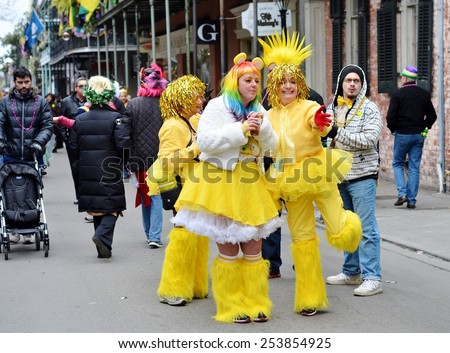 NEW ORLEANS, LA.-FEBRUARY 17:  Party people in costumes and masks parade through the streets of the New Orleans French Quarter on Mardi Gras Day, Tuesday, February 17, 2015.