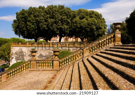 Beautiful old steps of grand entrance in classical italian garden