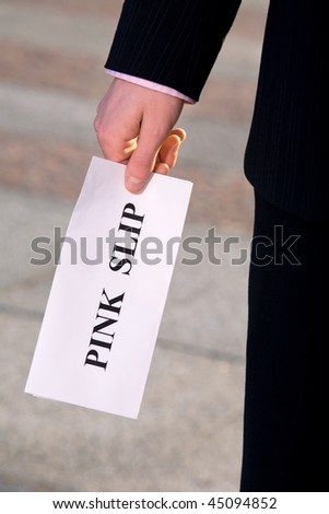 Financial crisis. Manager holding a job termination notice Pink Slip