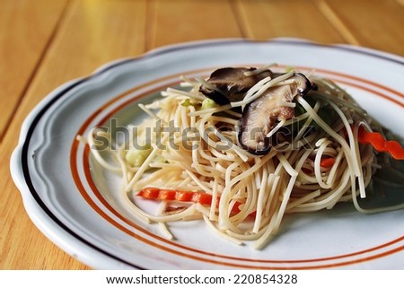 Vegan noodles dish / Vegan dish for vegetarian people filled with noodles and vegetable and mushroom.