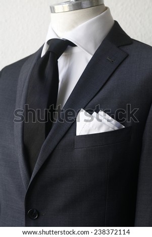 mens suit, suit on bust
