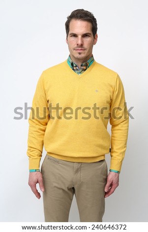 man with yellow sweater, man with fabric trousers, family father, young man