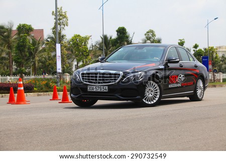 Hanoi, Vietnam - May 15, 2015: Mercedes-Benz S-Class car running on the road in Mercedes-Benz Driving Academy event in Vietnam. This event is opening for everybody in Vietnam.
