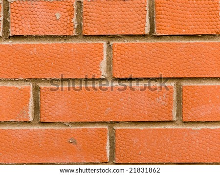 Laying of a wall from a clay brick