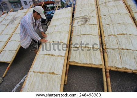 Hsinchu, Taiwan, September 17, 2013 Drying rice vermicelli noodles the traditional way in Taiwan