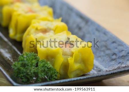 Chinese Steamed Dumpling  on wooden table
