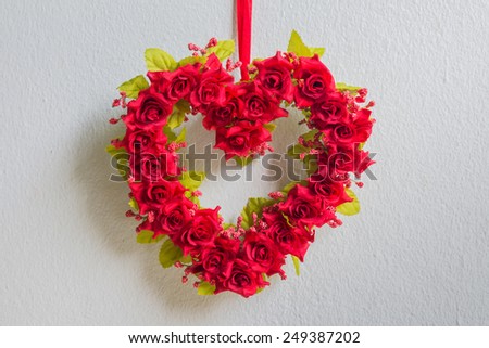 Still life with Bouquet of red roses, heart shape over grunge background, Valentine concept