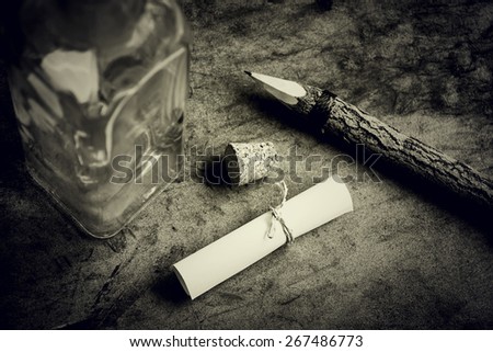 message in a bottle, written message on paper for put in the glass bottle over grunge background.