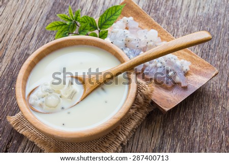 soybean milk on wooden table, rustic style