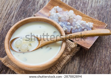 soybean milk on wooden table, rustic style