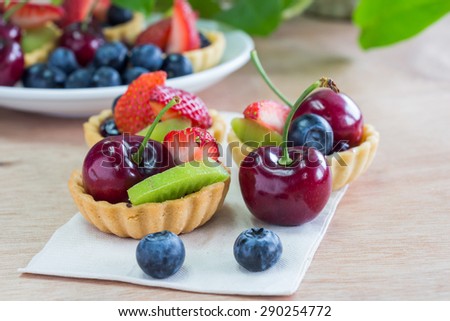 Fresh Fruit Tart on wooden table