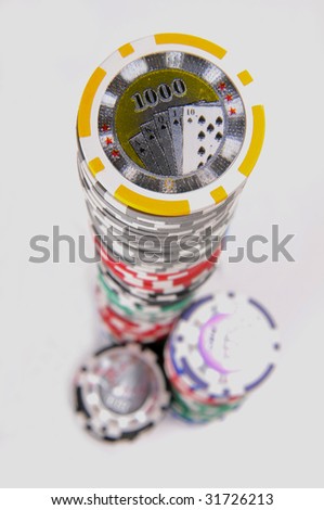 Poker chips tower isolated on white background