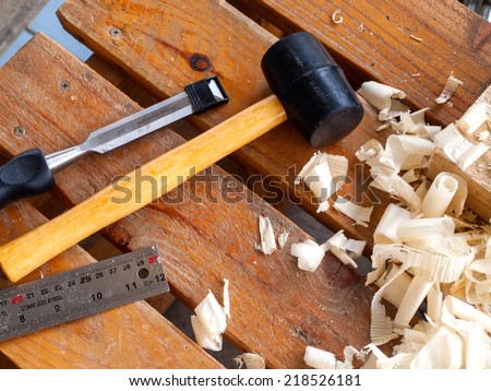 Carpenter work tools, rubber mallet, wood, chisel, ruler