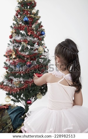 Children decorated christmas tree on white background with gifts