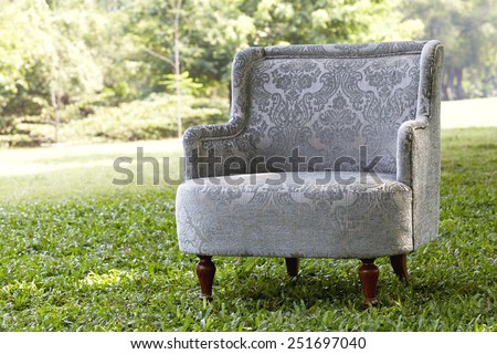 Classic vintage gray sofa set in the garden,Rim Light