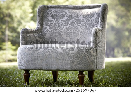 Classic vintage gray sofa set in the garden,Rim Light