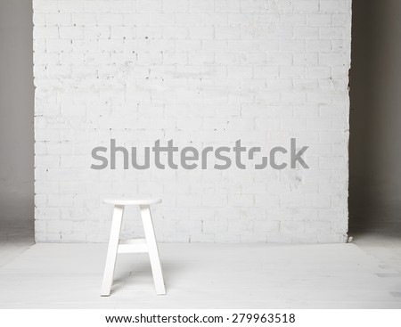 White chairs, white walls.