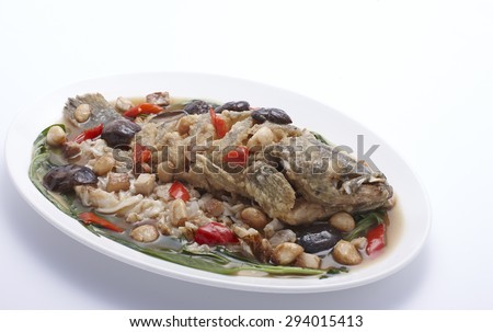 fried fish with Noodle fresh herbs and sweet sauce on plate, food Thailand.