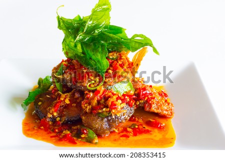 stir fried deep fried catfish with curry paste