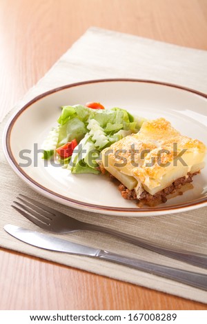 Front ground beef meat with tomato and cream