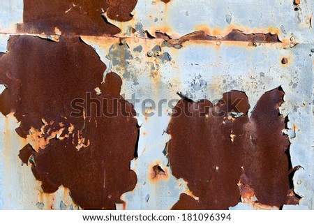 Rust and peeling blue paint background