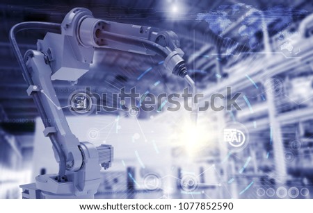 heavy automation robot arm machine in smart factory industrial,Industry 4.0 concept image.