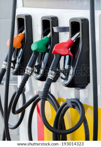 Fuel dispenser at a gasoline station