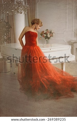 Photo stylized as old picture in which a woman in a red dress standing near a white grand piano head bowed.