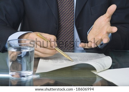 businessman signing an agreement after negotiation in the meeting room