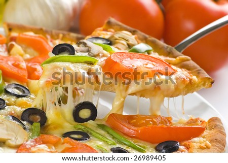 homemade pizza with fresh tomato olive mushroom cheese isolated